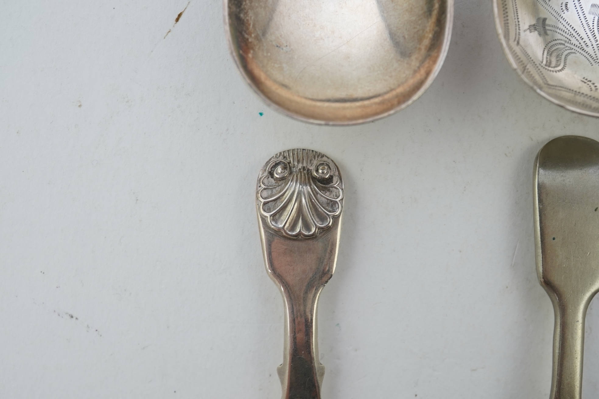 Nine assorted 19th century and later silver and white metal caddy spoons